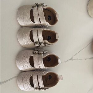 Two pair of baby dress shoes